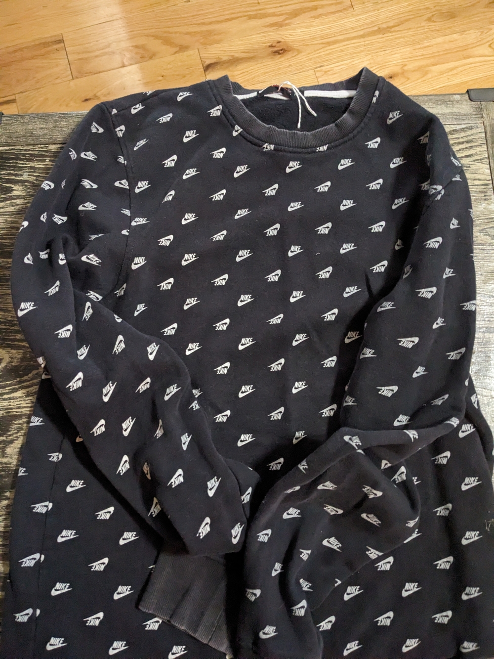 Nike Black Sweatshirt with White Mini Swoosh Pattern